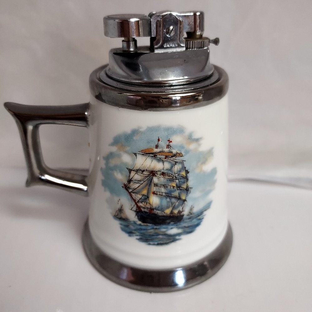 Vintage Colibri Lighter Ashtray Ship Flyng Clouds....B107